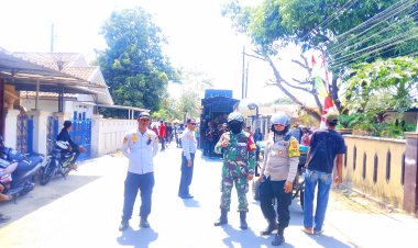 *SINERGI* TNI-Polri dan Dishub, Arak-arakan Sisingaan di Kelurahan Soklat Berjalan Aman